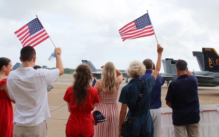 Dozens of family members gathered Friday, July 12, 2024, at Naval Air Station Oceana, Va., to welcome home four Virginia Beach-based fighter jet squadrons. The squadrons returned to the U.S. after nearly nine months on deployment with the USS Dwight D. Eisenhower Carrier Strike Group. 