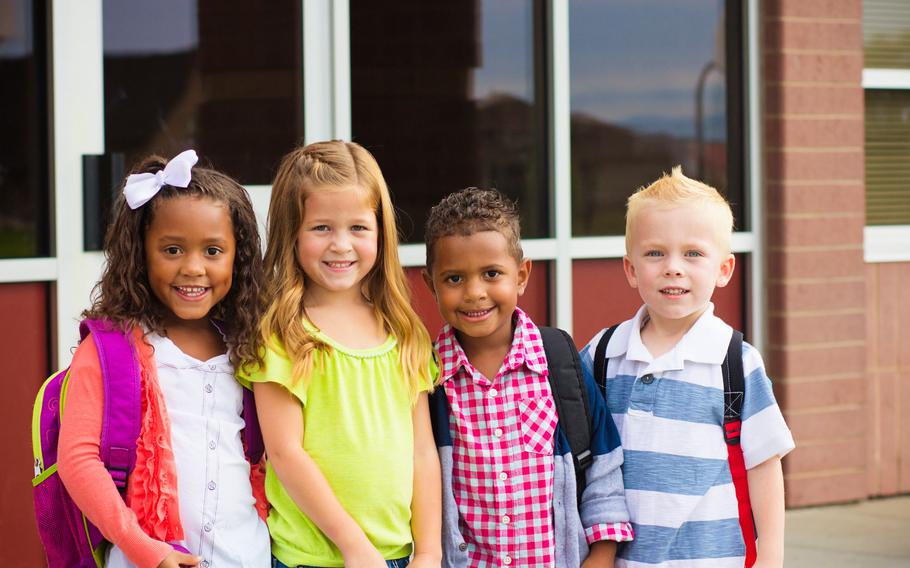 Portrait of young kids first day of School