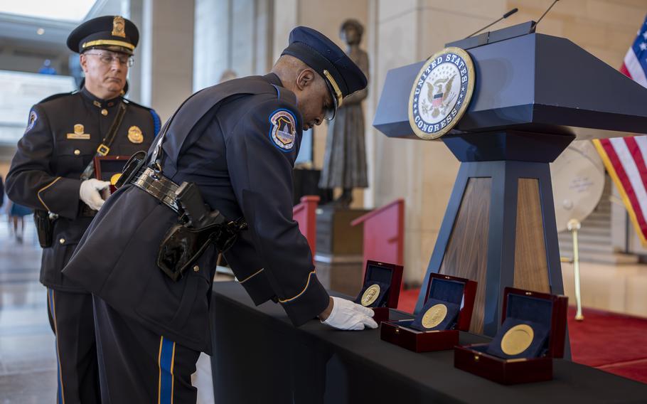 U.S. Capitol Police honor guards place Congressional Gold Medals to be presented at the Capitol