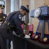 U.S. Capitol Police honor guards place Congressional Gold Medals to be presented at a ceremony to honor the Black women mathematicians of NASA who contributed to the space race and who were the subject of the movie "Hidden Figures," at the Capitol in Washington, Wednesday, Sept. 18, 2024. (AP Photo/J. Scott Applewhite)