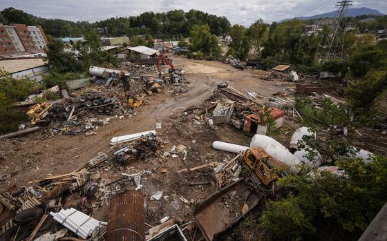 FILE - Debris is visible in the aftermath of Hurricane Helene, Sept. 30, 2024, in Asheville, N.C. (AP Photo/Mike Stewart, File)