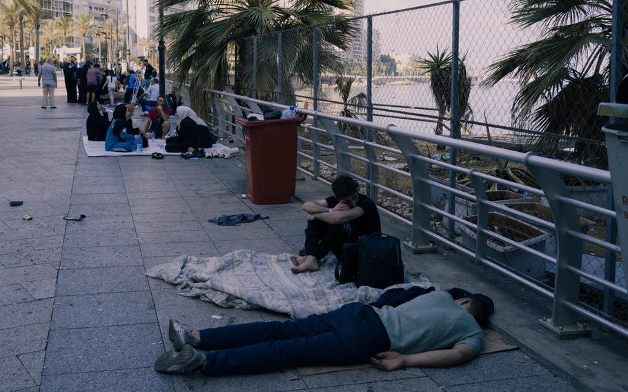 People sleep in the street in the center of Beirut and along the sea promenade.