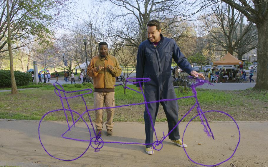 Zachary Levi, right, and Lil Rel Howery star in “Harold and the Purple Crayon.”