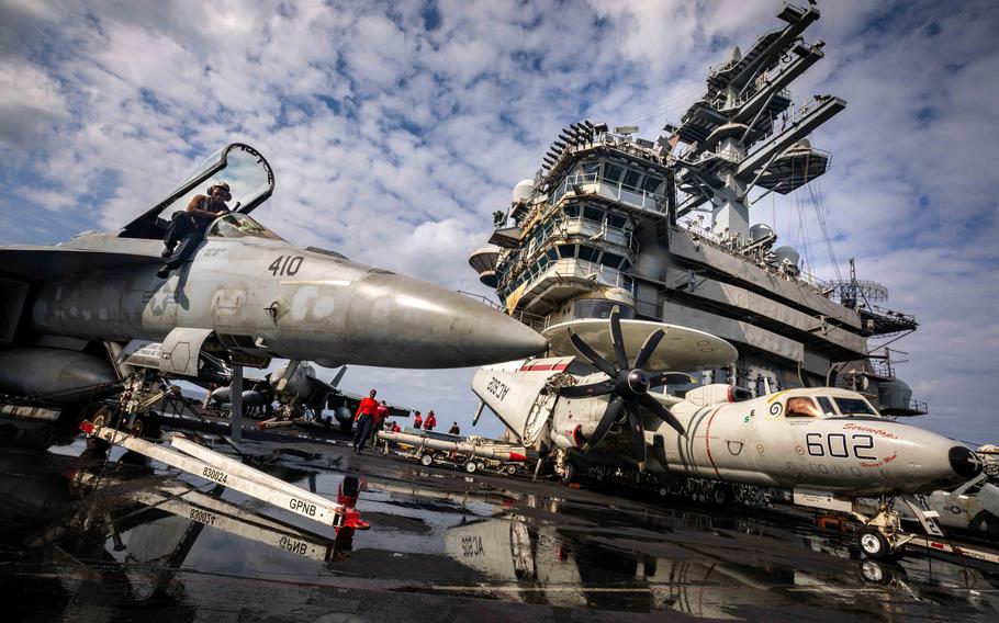 Sailors work on the flight deck of the aircraft carrier USS Dwight D. Eisenhower in the Red Sea on Feb. 6, 2024. The  Eisenhower strike group is now transiting the Atlantic Ocean as it returns to the U.S. after nearly nine months on deployment in the Middle East and eastern Mediterranean Sea.