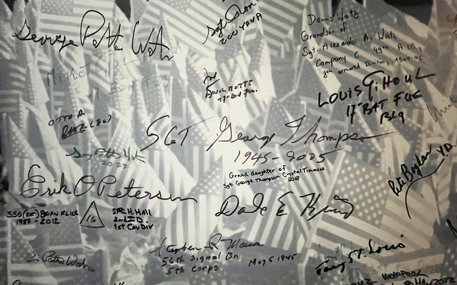 A wall display signed by American and Belgian veterans of the liberation of Pilsen, as well as by members of the Patton family, is seen here at the Patton Memorial Pilsen, Czech Republic, on May 4, 2024.