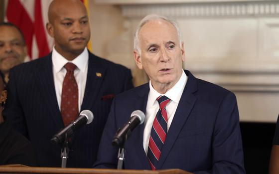 FILE - Paul Wiedefeld, a former general manager and CEO of Metro, speaks at a news conference as Gov. Wes Moore, left, listens, Jan. 24, 2023, in Annapolis, Md. (AP Photo/Brian Witte, File)