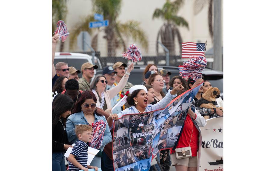 Families and friends welcome the USS Russell during the ship’s homecoming ceremony 