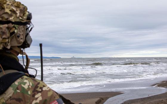 Sailors aboard the U.S. Coast Guard Cutter Stratton relay maritime domain awareness information to Green Berets assigned to 10th Special Forces Group on Wales, Alaska, during Operation Polar Dagger, Aug. 19, 2024.