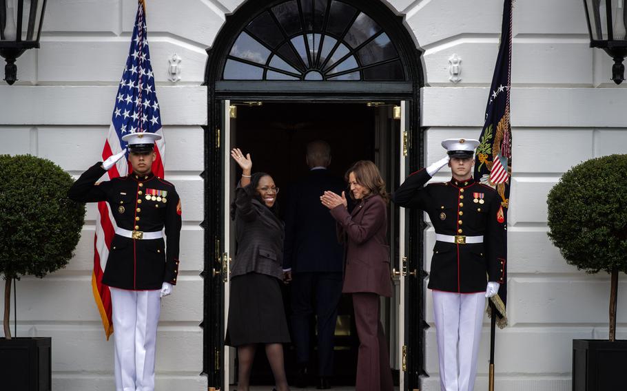 Ketanji Brown Jackson and Vice President Kamala Harris follow President Joe Biden into the White House.