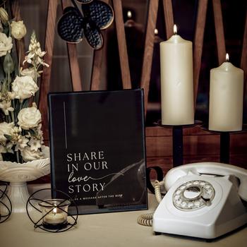 This photo shows another audio wedding guest book offered for rent by FêteFone. FêteFone also offers a phone in the shape of pink lips and another shaped like a cheeseburger, among its options.  