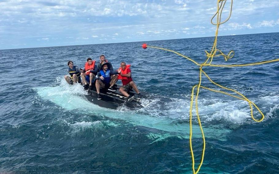 A Coast Guard Station Mayport, Fla., boat crew rescues five people after their vessel capsized offshore on Sunday, July 7, 2024. 