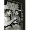 HED: Tasty cake, 1960

Seoul, South Korea, October 1960: Yong Kun (Tex) Kim enjoys a piece of cake at the USO in Seoul. Found wandering the streets alone, the 8-year-old orphaned boy has been cared for by personnel of the USO Seoul. 

Stars and Stripes’ Pacific archives house many images of South Korean children affected by the Korean War. Many are of orphans living in homes founded and/or funded by either U.S. servicemembers or the United Nations. Also found in our archives are images of so-called “Unit Mascots,” children orphaned by the war who were “adopted” by U.S. military units. The children would live on base or in camp with the unit and were often outfitted in smaller versions of the unit’s uniform. Unfortunately, we know little to nothing of what happened to them.

Looking for Stars and Stripes’ historic coverage, including that on so-called "Unit Mascots"? Subscribe to Stars and Stripes’ historic newspaper archive. We have digitized our 1948-1999 European and Pacific editions, as well as several of our WWII editions and made them available online through https://starsandstripes.newspaperarchive.com/

META TAGS: USO; United Services Organization; Korean; orphan; orphaned children; Korean war; unit mascot