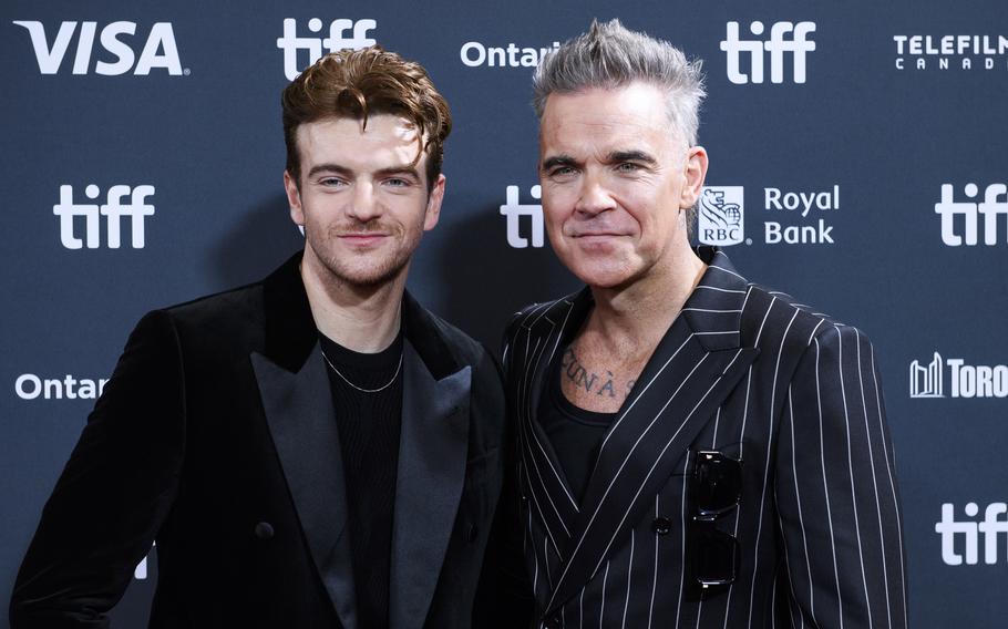 Jonno Davies and Robbie Williams attend the premiere of “Better Man,” during the 2024 Toronto International Film Festival, Sept. 9. Davies plays Williams in the music biopic “Better Man” but does so as a CGI chimpanzee. 