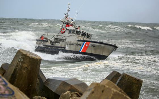 A U.S. Coast Guard boat is seen at sea. 