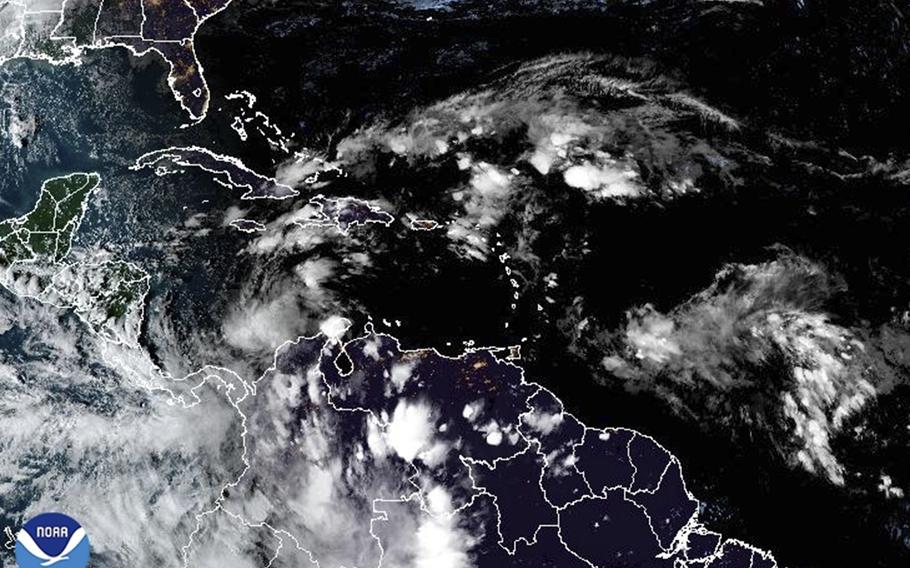 This satellite image provided by NOAA shows weather systems Sunday, Nov. 3, 2024. 