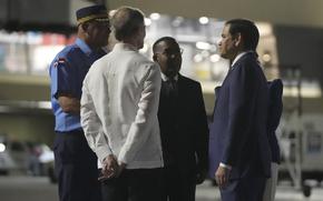 U.S. Secretary of State Marco Rubio is received by Foreign Minister Roberto Álvarez, second left, on the tarmac of Las Americas International Airport in Santo Domingo, Dominican Republic, Wednesday, Feb. 5, 2025. (AP Photo/Mark Schiefelbein, Pool)