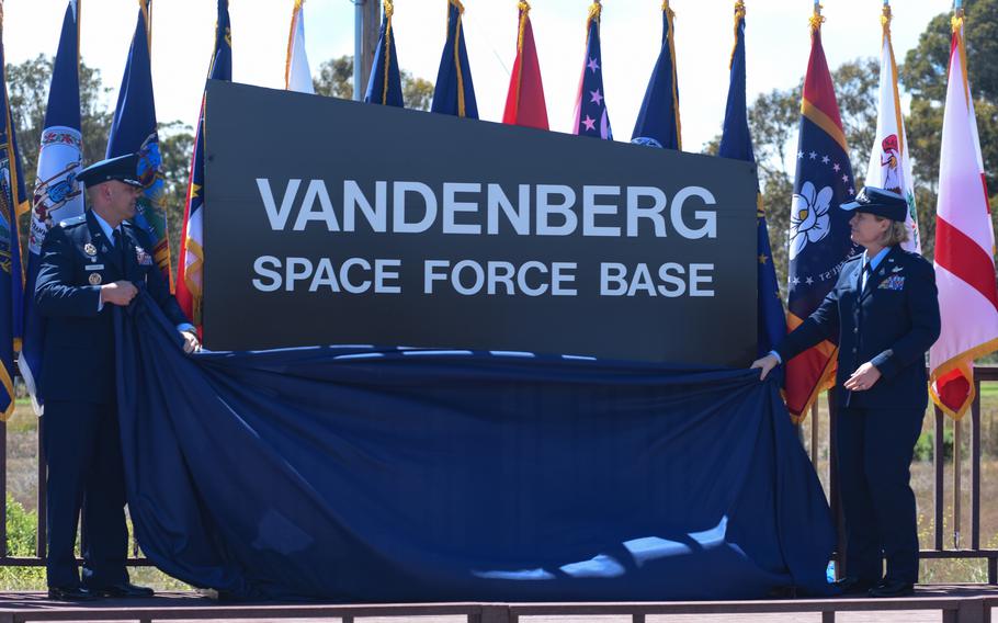 Col. Anthony Mastalir, Space Launch Delta 30 commander, and Maj. Gen. Deanna Burt, Combined Force Space Component Command commander, unveil Vandenberg’s new U.S. Space Force name during a base renaming in 2021 at Vandenberg Space Force Base, Calif. 