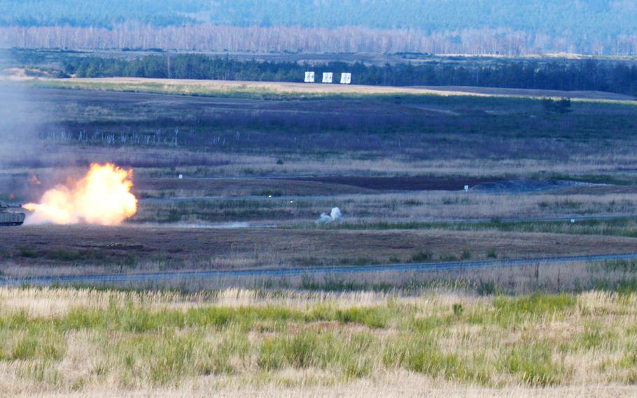 A tank fires at a target.