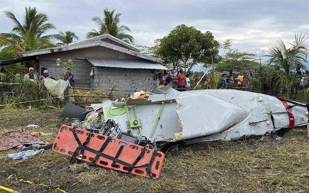 Wreckage of airplane in a rice field in Maguindanao del Sur province, Philippines.