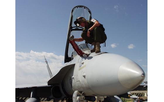 HED: Manas Air Base, 2002

Peter J. Ganci Air Base, Kyrgyzstan, June 11, 2002: Cpl. Randy Novak, an aircraft mechanic with Marine Fighter Attack Squadron 121 checks the refueling cone on an F/A-18D Hornet. 

The U.S established the strategic air base at the Manas International Airport to support its military operations in Afghanistan in 2001. Russia, wary of a long-term U.S. presence in the region, exerted pressure on the Kyrgyz government to revoke the lease agreement with the U.S. This, as well as growing anti-American sentiments in the country led to the closure of the center in 2014. During its 13 years of operation the U.S. paid some $318 million to Kyrgyzstan in direct investments and additional indirect financial and non-financial benefits. 
                   
META TAGS:  U.S. Transit Center
at Manas (TCM); Manas Air Base; US-Russian relations; Wars on Terror; Operation Enduring Freedom; 