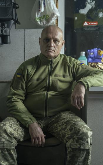 A Ukraine soldier at home.