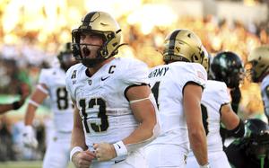 A football player shouts in celebration.