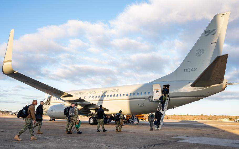 U.S. 2nd Fleet personnel board a Marine Corps C-40 at Naval Air Station Oceana, Va., Feb. 7, 2024, for a flight to Bodo, Norway. About 100 sailors and Marines have been deployed to the Arctic city for exercise Steadfast Defender.