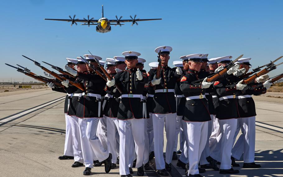 U.S. Marines with the Silent Drill Platoon execute a drill sequence