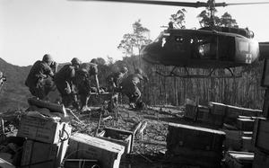 The 3rd Battalion, 187th Infantry Regiment of the 101st Airborne Division on the day they took the mountain, west of A Shau Valley, called Dong Ap Bia, or Hamburger Hill. A Huey evacuation helicopter lands on a tiny clearing on "Hamburger Hill" as a wounded American soldier is rushed aboard. Men of the 3rd Battalion, 187th Infantry Regiment, 101st Airborne Division are trying to take the bomb-scarred, blood-soaked mountaintop from North Vietnamese forces.