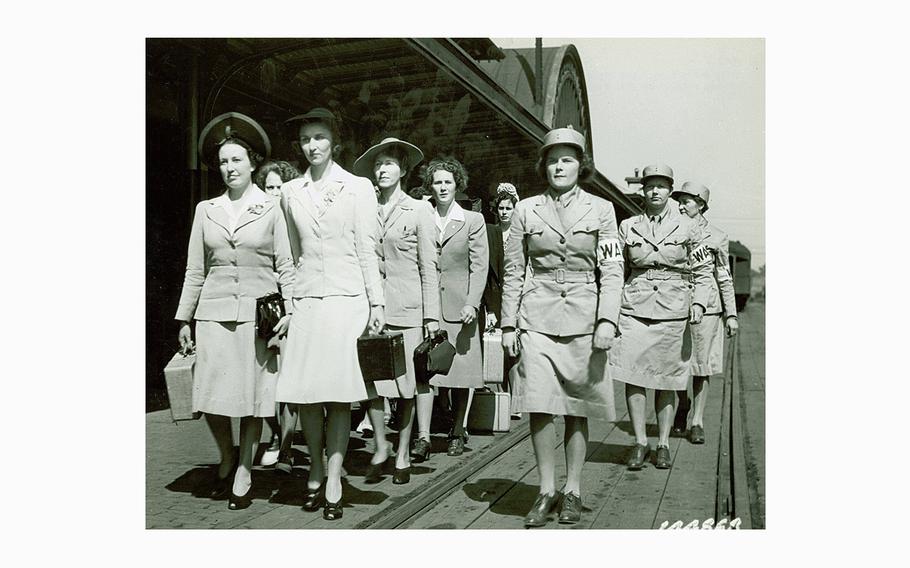 Women’s Army Corp members march with new recruits.