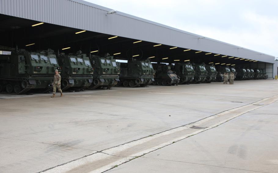 U.S. Army M270A2 Multiple Launch Rocket Systems are parked at the 1st Battalion, 6th Field Artillery motor pool at Tower Barracks in Grafenwoehr, Germany