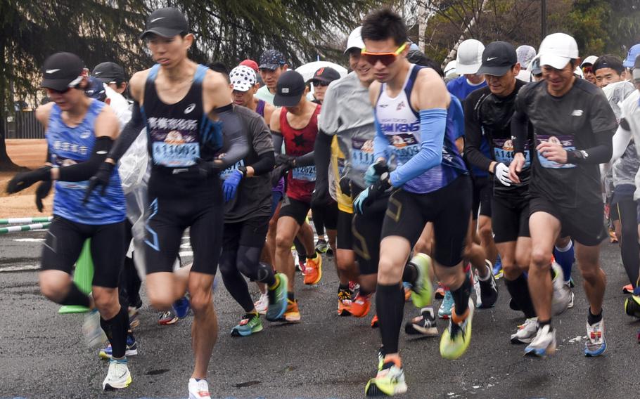 Wet feet Thousands turn out for soggy Frostbite road race at US air