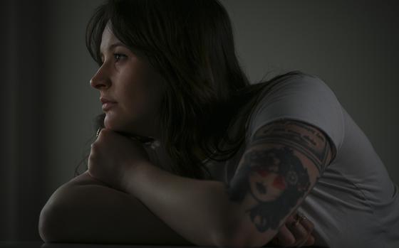  Miranda Powell, 28, at her home in Rosslyn, Va. Powell was a Navy corpsman who paid a for-profit company $8,000 to help her increase her disability benefits after she left the military. She says the firm took advantage of her and used predatory tactics. MUST CREDIT: Ricky Carioti/The Washington Post
