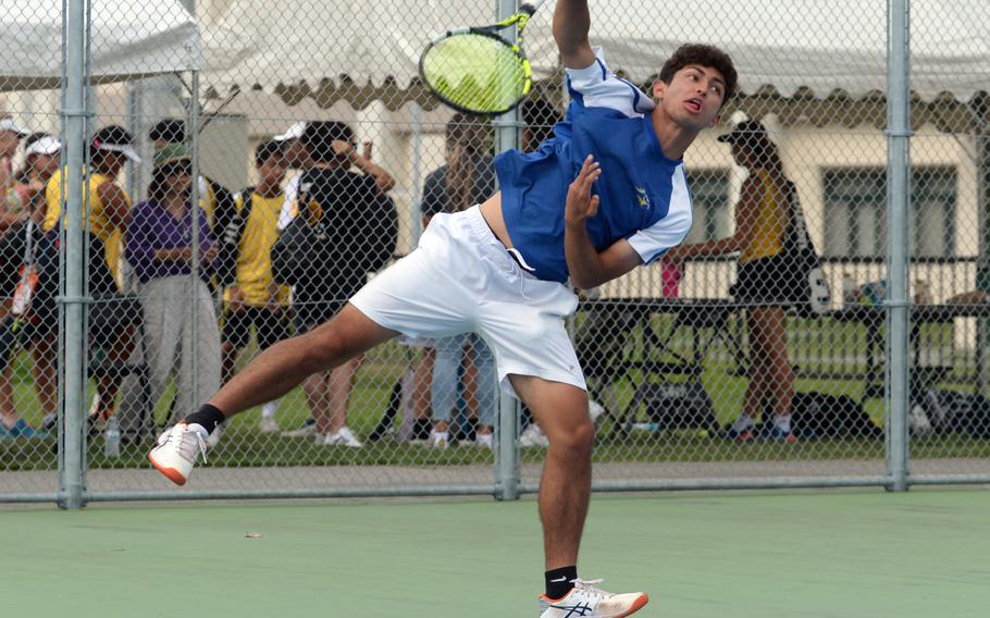 Ryunosuke Roesch hits the ball.