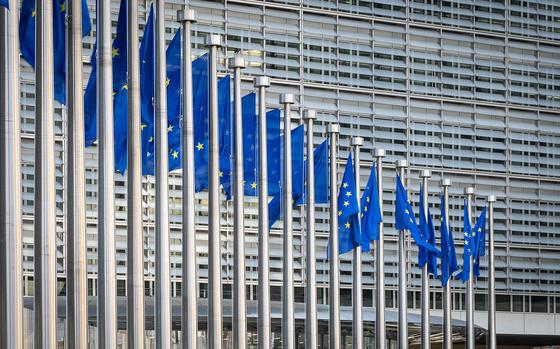 A picture taken in Brussels on April 18, 2023, shows European flags at the Berlaymont building which houses the headquarters of the European Commission, the executive branch of the European Union (EU). (James Arthur Gekiere/Belga/AFP via Getty Images/TNS)