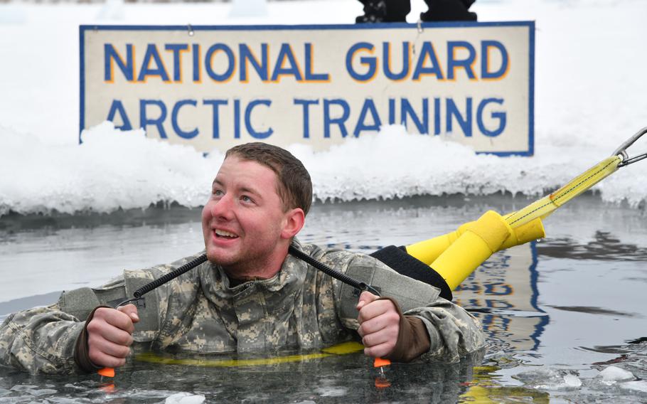 An airman participates in a cold-water immersion