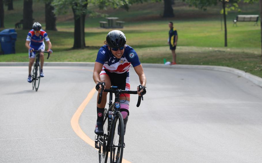 Kelly Elmlinger powers her way up a tough incline during the women’s cycling event at High Park, Toronto, Canada, Sept. 26, 2017 during the Invictus Games. 