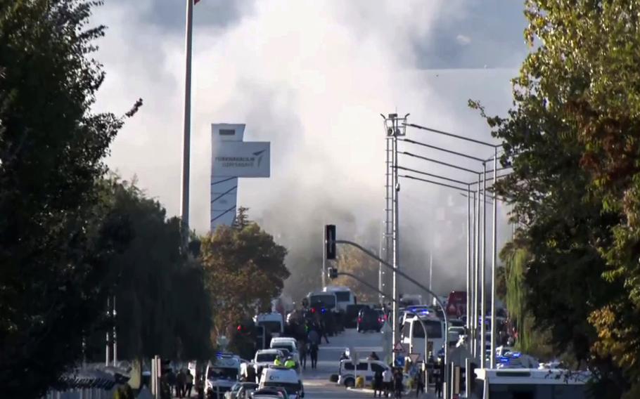 Smoke raises outside Turkish Aerospace Industries Inc. on the outskirts of Ankara, Turkey, Wednesday, Oct. 23, 2024.