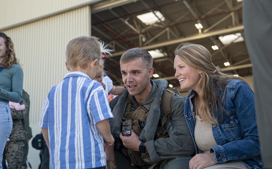 Marine reunites with his family