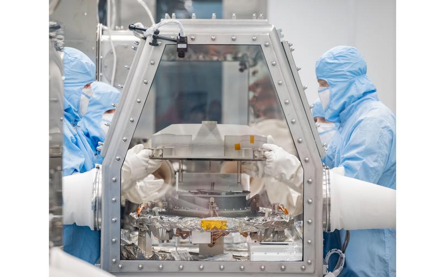 OSIRIS-REx Asteroid Sample Return lid opening at Building 31 Astromaterials Curation Facility. The Origins, Spectral Interpretation, Resource Identification, and Security-Regolith Explorer spacecraft (nicknamed OSIRIS-REx) launched in 2016 and headed to Bennu with the goal of collecting NASA’s first asteroid sample and delivering it back to Earth. 