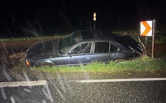 A BMW got stuck in a ditch on Highway 423 after it rolled almost 100 meters in a field, police said. 