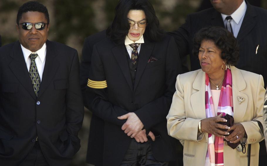 Pop star Michael Jackson, center, his mother Katherine Jackson, right, and brother Tito Jackson, left, leave Santa Barbara County Superior Court in Santa Maria, Calif., April 7, 2005, after another day of testimony in Michael Jackson’s child molestation trial. 