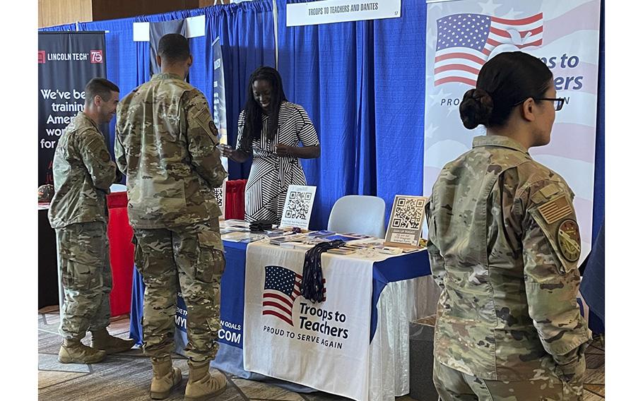 A Troops to Teachers booth is seen at a job fair in San Antonio, Texas, in August 2022.