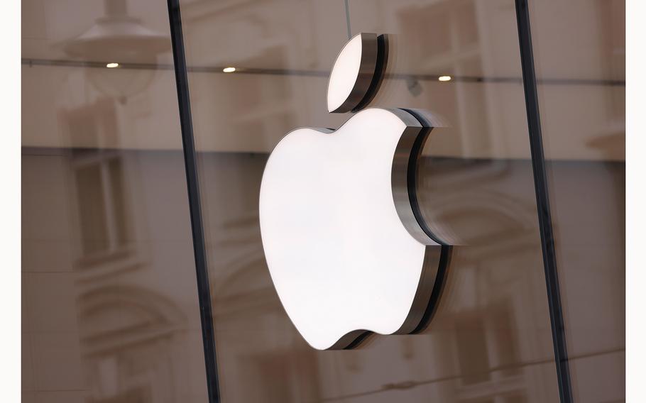 The Apple logo hangs on an Apple Store on March 25, 2024, in Berlin. 