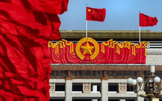 A Chinese national flag at the National Museum of China following the closing of the Second Session of the 14th National People's Congress in Beijing on March 11. MUST CREDIT: Bloomberg