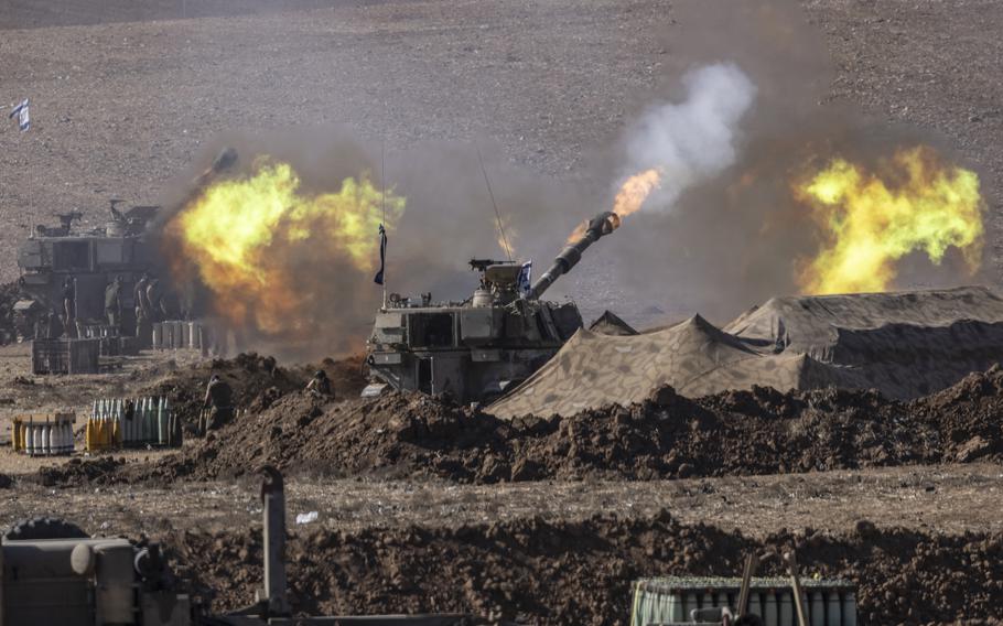 Israeli forces fire artillery toward Gaza on Nov. 6, 2023.