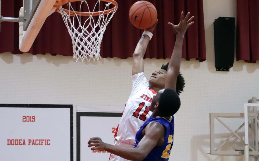 Isaiah Kimbrough goes up for a dunk.