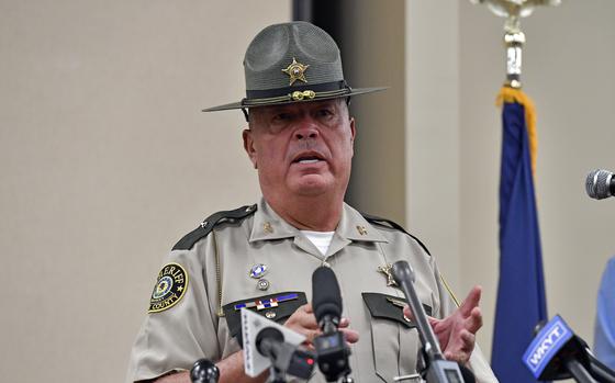 Laurel County sheriff John Root gives an update at the London Community Center in London, Ky., Sunday, Sept. 8, 2024, on the efforts to find the suspect in the Saturday shooting at Interstate 75 near Livingston, Ky. (AP Photo/Timothy D. Easley)