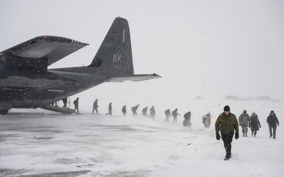 Members of Alaska’s Army National Guard and Air National Guard arrive in Gambell, Alaska, in March 2023.