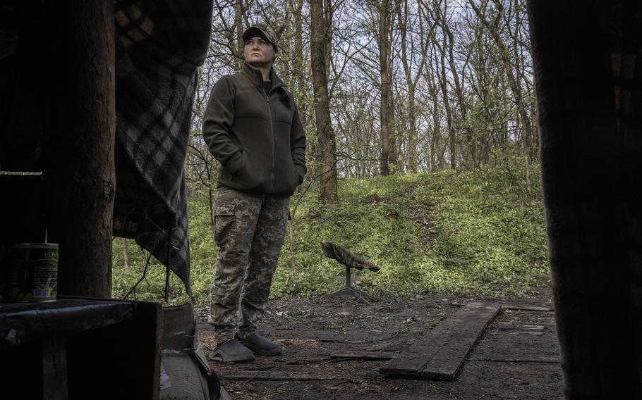 A medic from Ukraine's 43rd Brigade stands next to Starlink equipment at a base in the Bakhmut district on April 19, 2023, in Donetsk Oblast, Ukraine. 